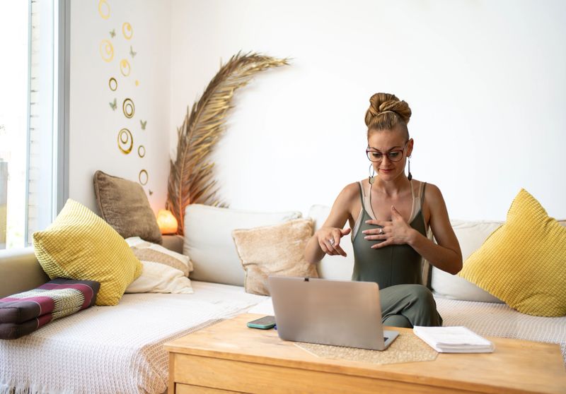 Life coach leading an online session from her home office, providing guidance and support to clients remotely