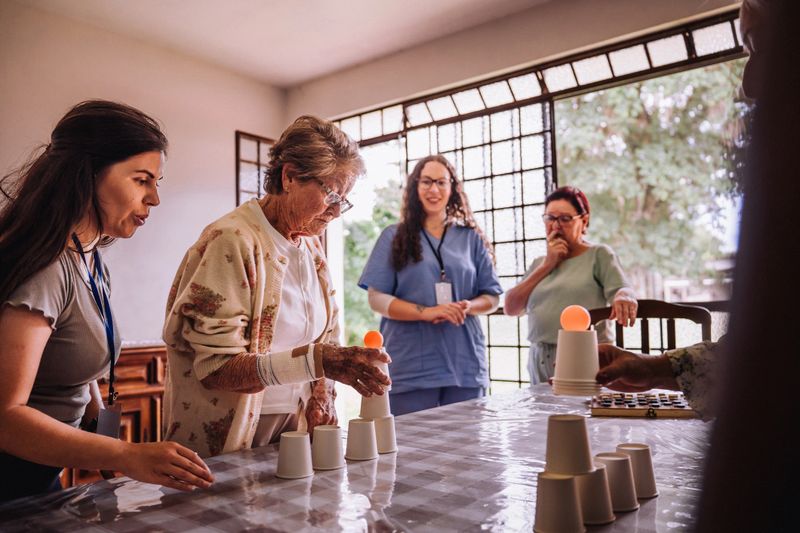 Volunteers playing pranks on elderly women in nursing homes