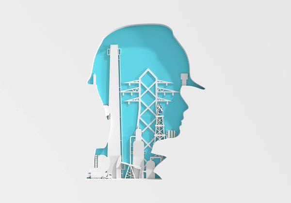 Silhouette of a worker filled with industrial structures against a blue background.