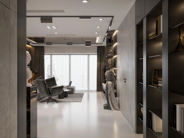 Modern living room with sleek furniture and artistic sculptures.