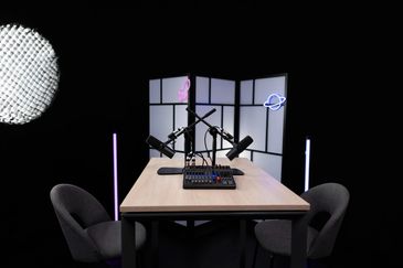 Vibrant podcast session with intriguing topics.