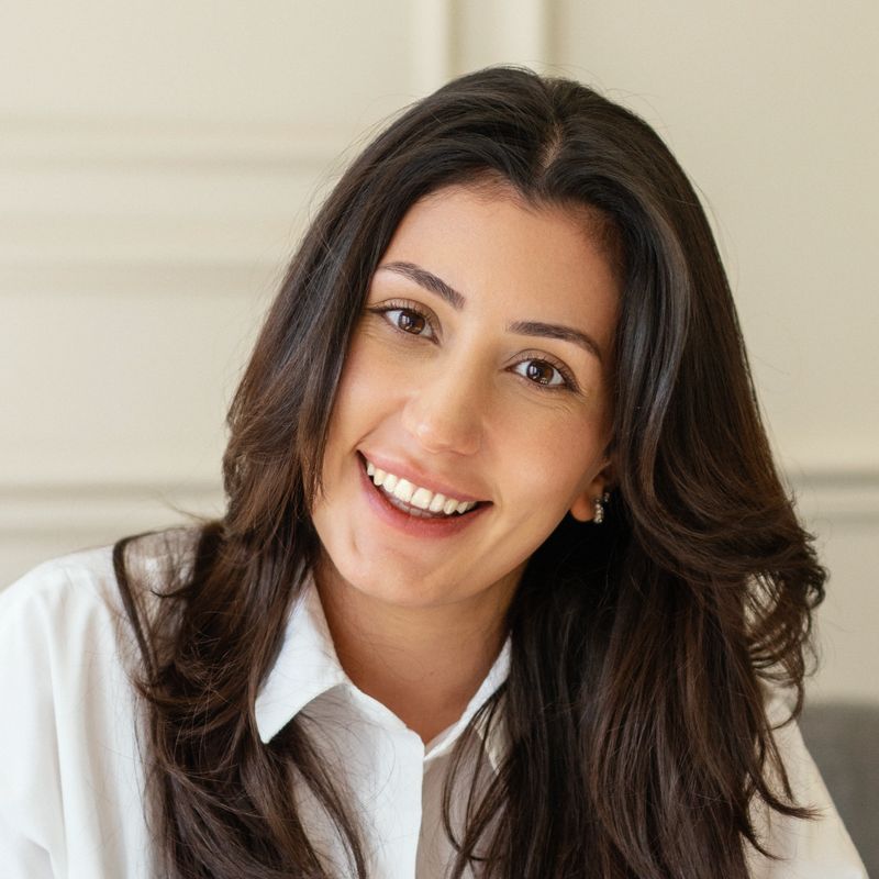 Confident businesswoman smiling portrait, close up