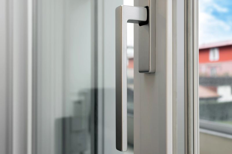 Aluminum window open detail. Metal door frame closeup view. Sound insulation. Energy efficient, safety profile, blur garden outdoor background.