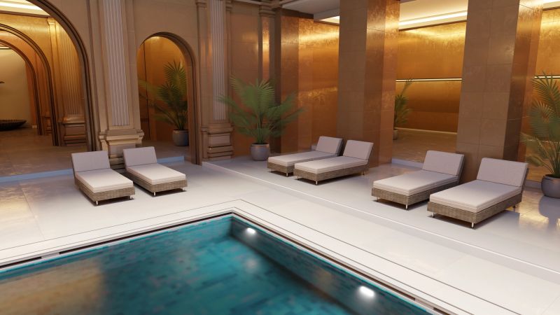 Modern loungers surround a tranquil indoor pool, complemented by stylish decor and ambient lighting. Lush plants enhance the serene environment, creating a perfect relaxation spot. 3d render