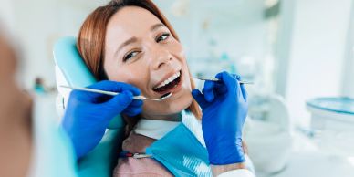 Woman getting dental checkup.