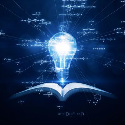 A glowing light bulb above an open book with floating scientific formulas.