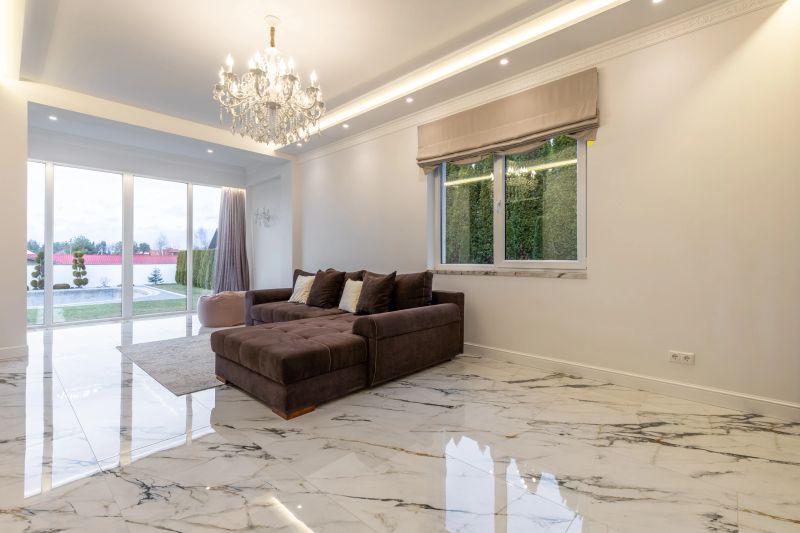 Modern epoxy flooring with a marble finish in a residential living room