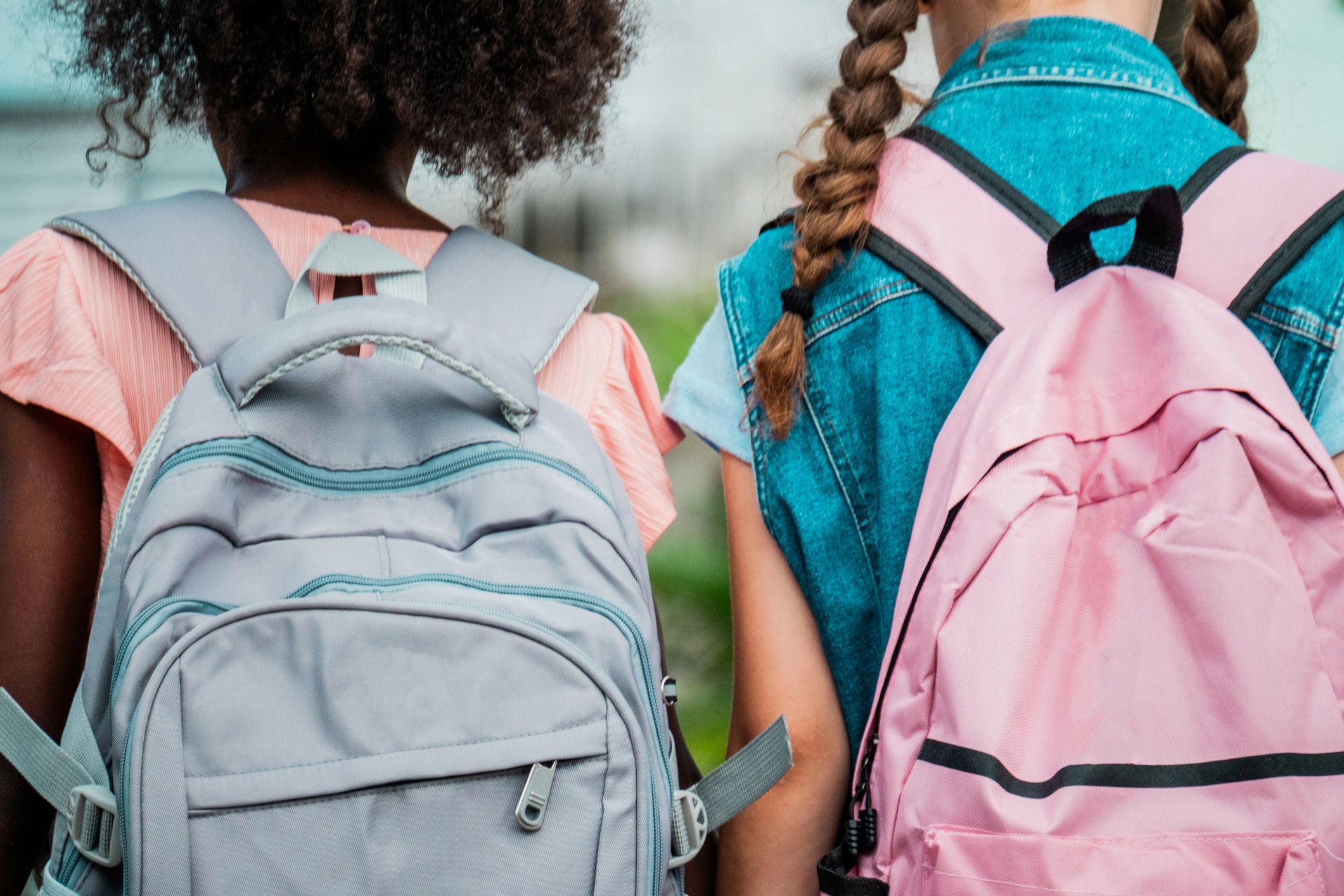 Girls with backpack for school.