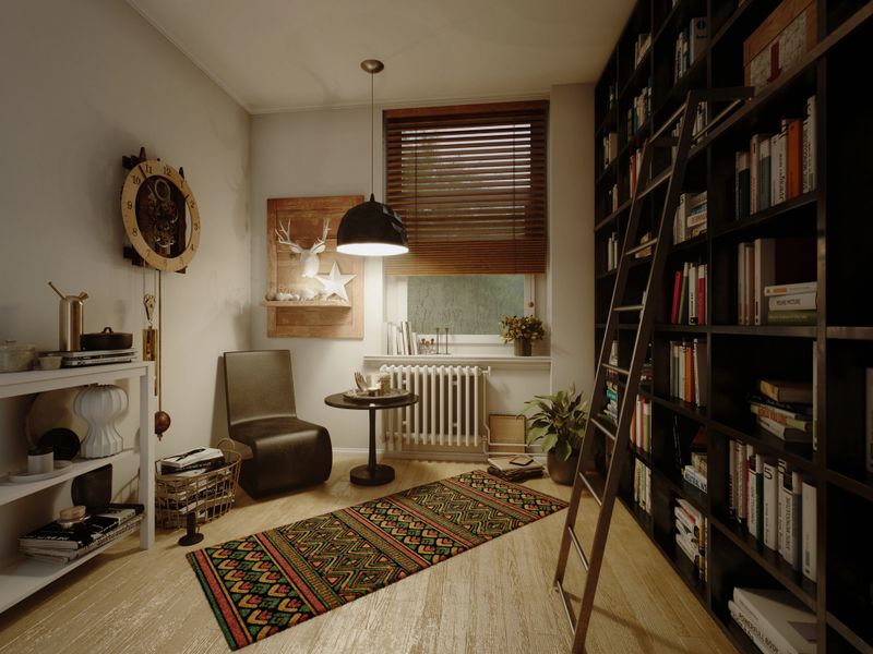 Digitally generated (without the use of any A.I. tools or technologies) cozy space designed for book lovers, blending retro charm with modern design. Light wood flooring sets a warm foundation, while dark bookshelves filled with books create a scholarly atmosphere. A brown leather armchair offers a comfortable reading spot, paired with a small round side table for a cozy evening in. A vibrant, patterned rug in red, green, and yellow adds a retro flair, complementing the mid-century modern vibe. A large window with wooden blinds floods the space with natural light, enhanced by a geometric pendant light. Vintage décor, including a wall clock, a wooden deer head artwork, and a potted plant near a ladder, brings personality and warmth. Post-processed for warm tones and rich textures, this image creates an inviting retreat for reading and reflection.The scene was created in Autodesk® 3ds Max 2025 with V-Ray 7 and rendered with photorealistic shaders and lighting in Chaos® Vantage with some post-production added.