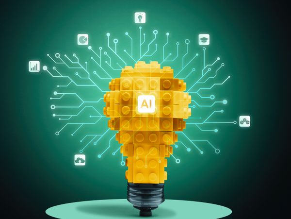 Yellow LEGO lightbulb with AI symbol and digital network icons.