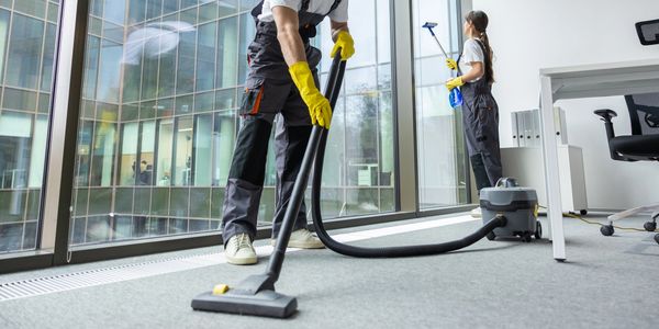 Cleaner using a hoover.
