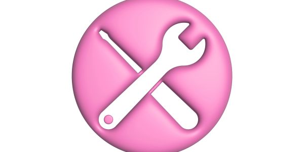 Pink circular icon with white wrench and screwdriver crossed.