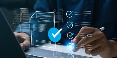 Person using digital checklist on laptop with a stylus pen.