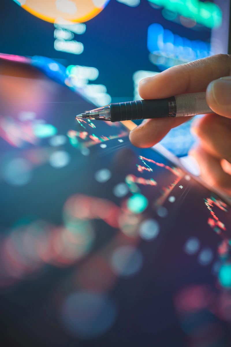 investor reviewing real-time financial performance, pie charts, and investment metrics using modern interface. highlights data visualization, AI-powered portfolio management, personal finance planning, and smart trading applications