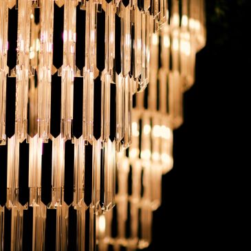 Close-up of an elegant lit chandelier.