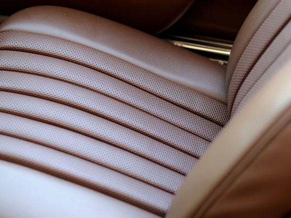 Illustrative leather seat stitching detail