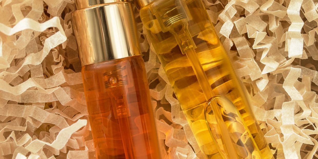 Rollon Spray bottle with gold cap on shipping paper