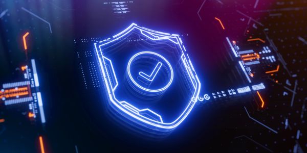 Glowing digital shield with checkmark symbol.