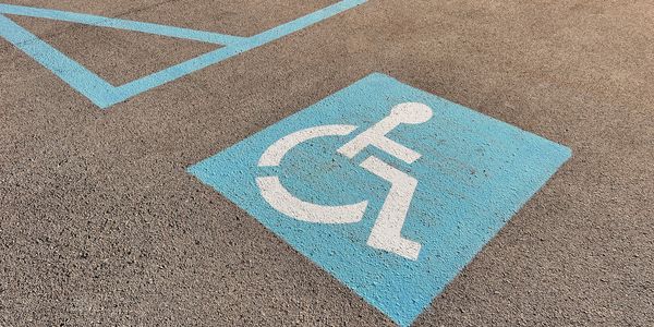 ADA accessible parking stall with wheelchair symbol striping for a Tampa Bay business