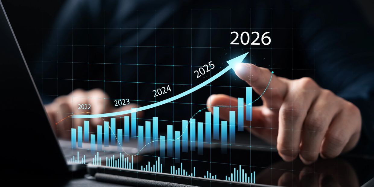Person interacting with a futuristic digital growth chart showing rising trends from 2022 to 2026.