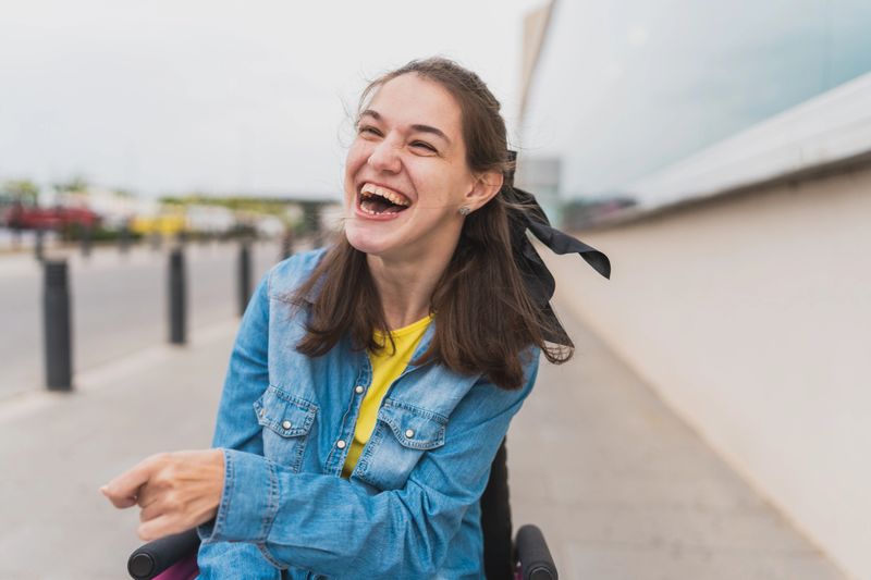 She radiates happiness and confidence after medical visit, concept of cerebral palsy
