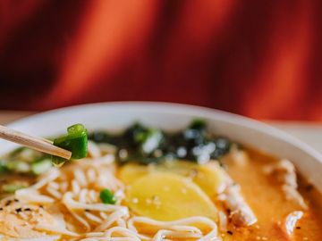 Creamy Pork Tonkotsu Ramen with toppings.