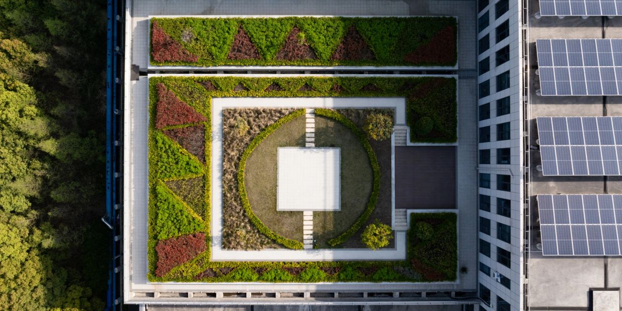 Aerial view of a rooftop garden with geometric patterns.