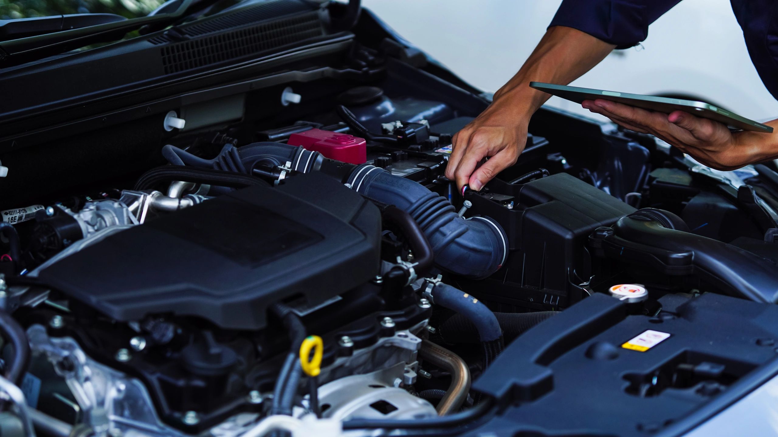 Mechanic working on car 