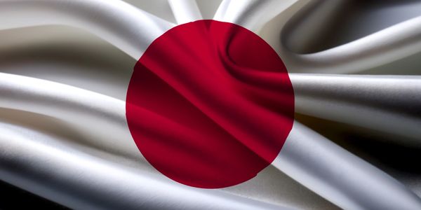Close-up of the Japanese flag with fabric folds.