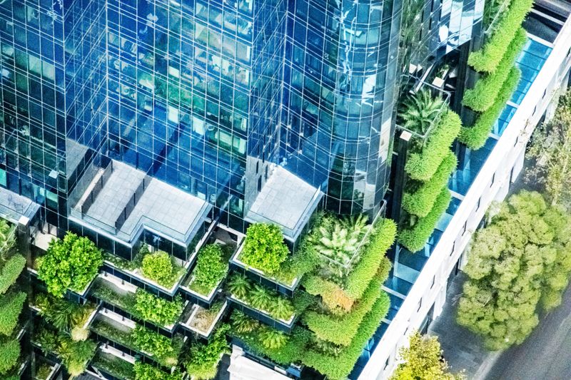 This environmentally green skyscraper in Melbourne Australia features window facade and gardens on the balconies. The lush foliage creates a green oasis. The image is taken of building Australia 108 in the Southbank area.