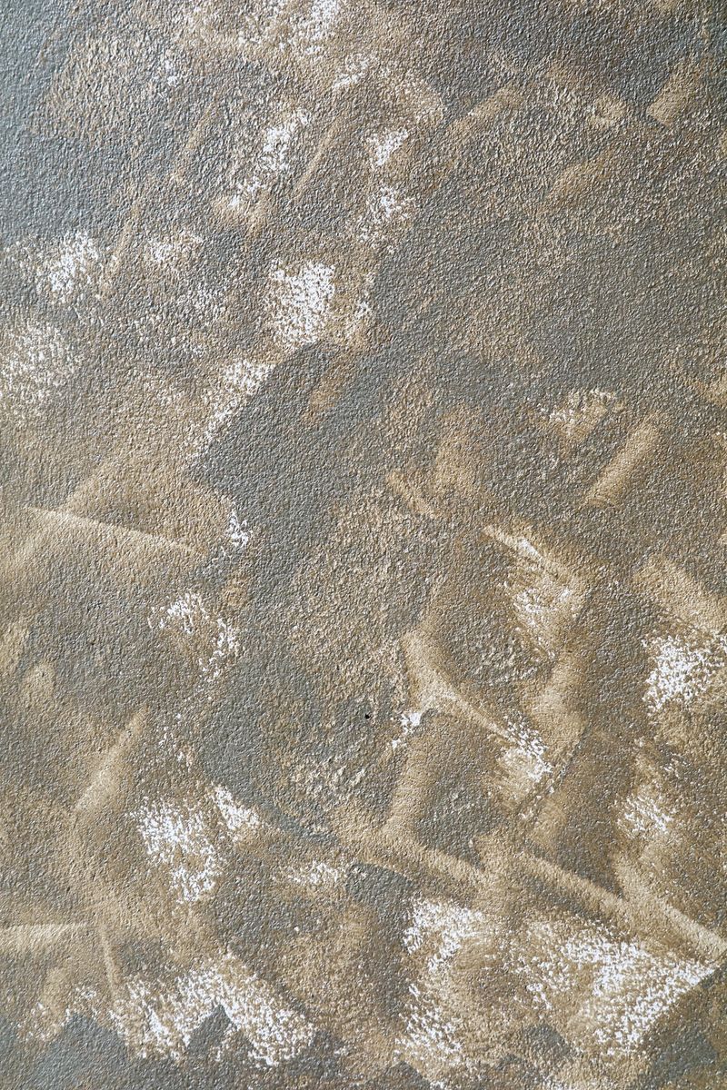 An abstract textured background showcasing earthy tones with intricate patterns. Ideal for artistic projects, design concepts, and natural aesthetics.