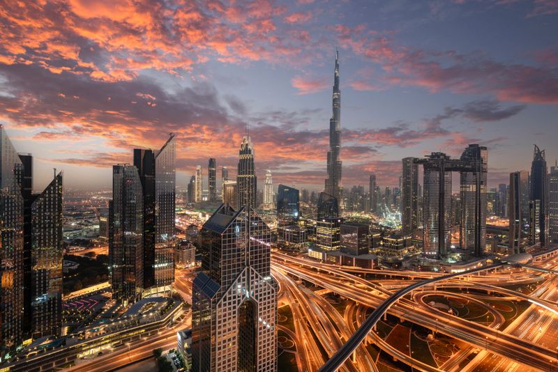 Dubai sky line with traffic junction and Burj Khalifa.