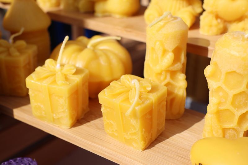 Explore beautifully crafted beeswax candles in charming shapes, perfect for decor and thoughtful gifts