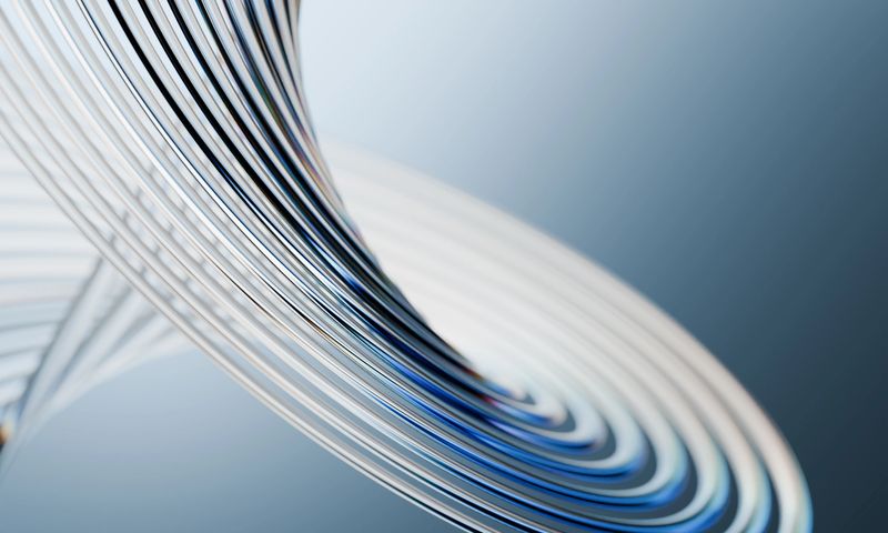 Artistic 3D Rendering of Smooth, Curving Clear and Blue Glass Surfaces, Elegant and Modern Backdrop