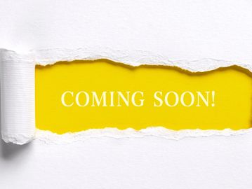 Yellow paper with 'COMING SOON!' message.