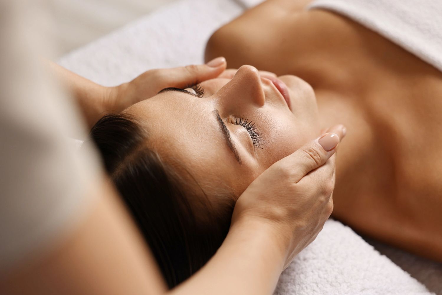 Woman  receiving a rejuvenating facial