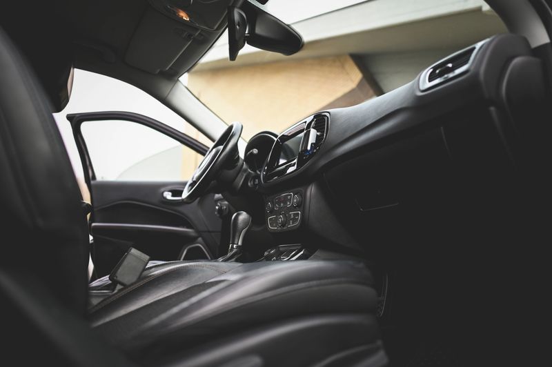 Empty interior of a modern car with leather seats and dashboard