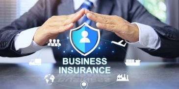 Businessman protecting a digital shield icon labeled 'Business Insurance'.