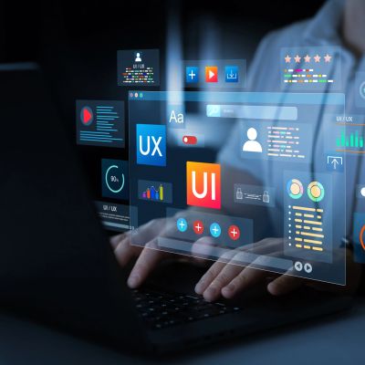 Digital interface with UI and UX elements on laptop.