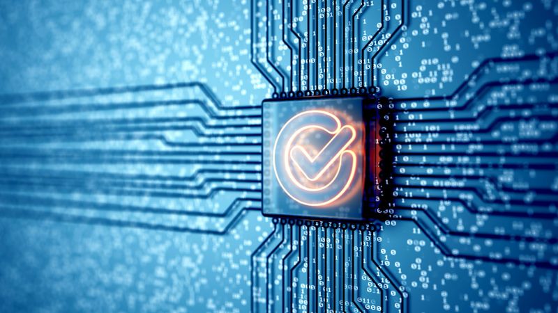 Close-up of a digital microchip with a glowing check mark symbol, representing cybersecurity, AI validation, or digital data verification.