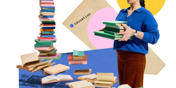 A woman holding books stands near a tall stack and scattered open books, symbolizing education.