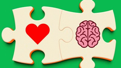 Two puzzle pieces with heart and brain icons.