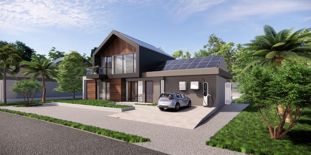 Modern eco-friendly house with solar panels and an electric car charging station.