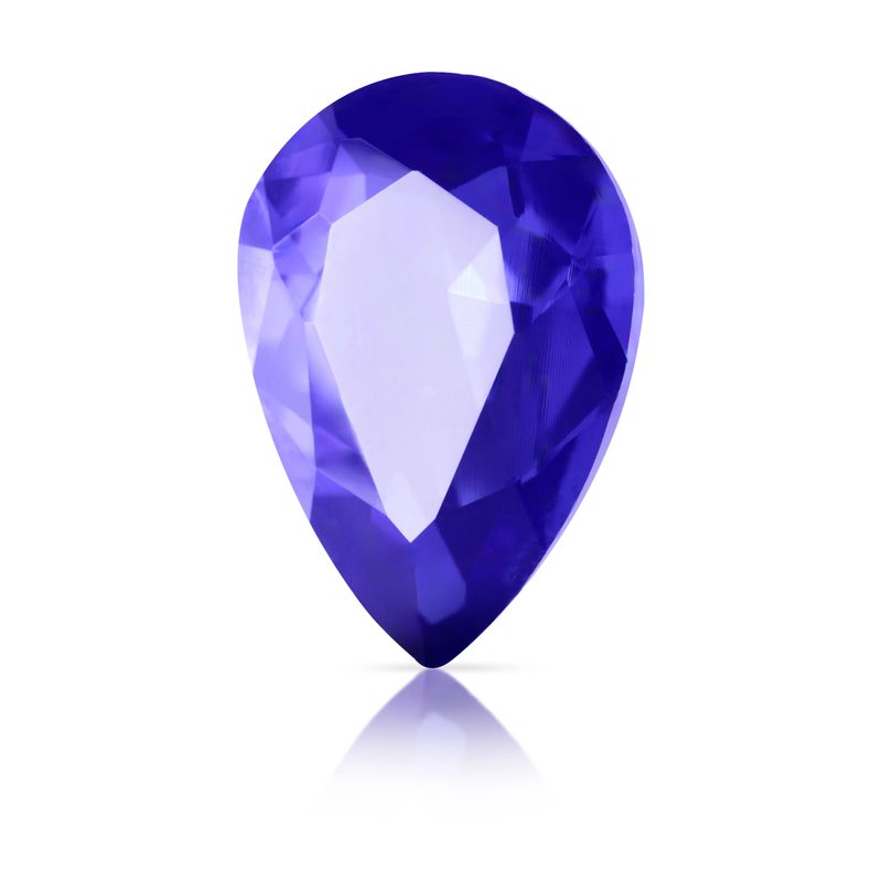 One violet blue shiny gemstone isolated on white