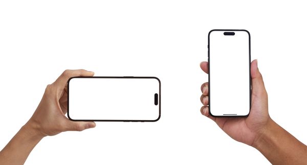 Two hands holding smartphones with blank white screens, one vertically and one horizontally.