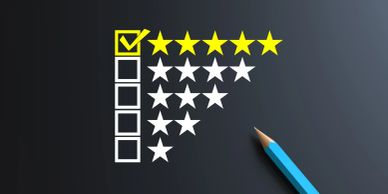A rating scale with five stars checked and a blue pencil beside it.