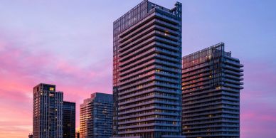 City high-rise buildings at sunset.