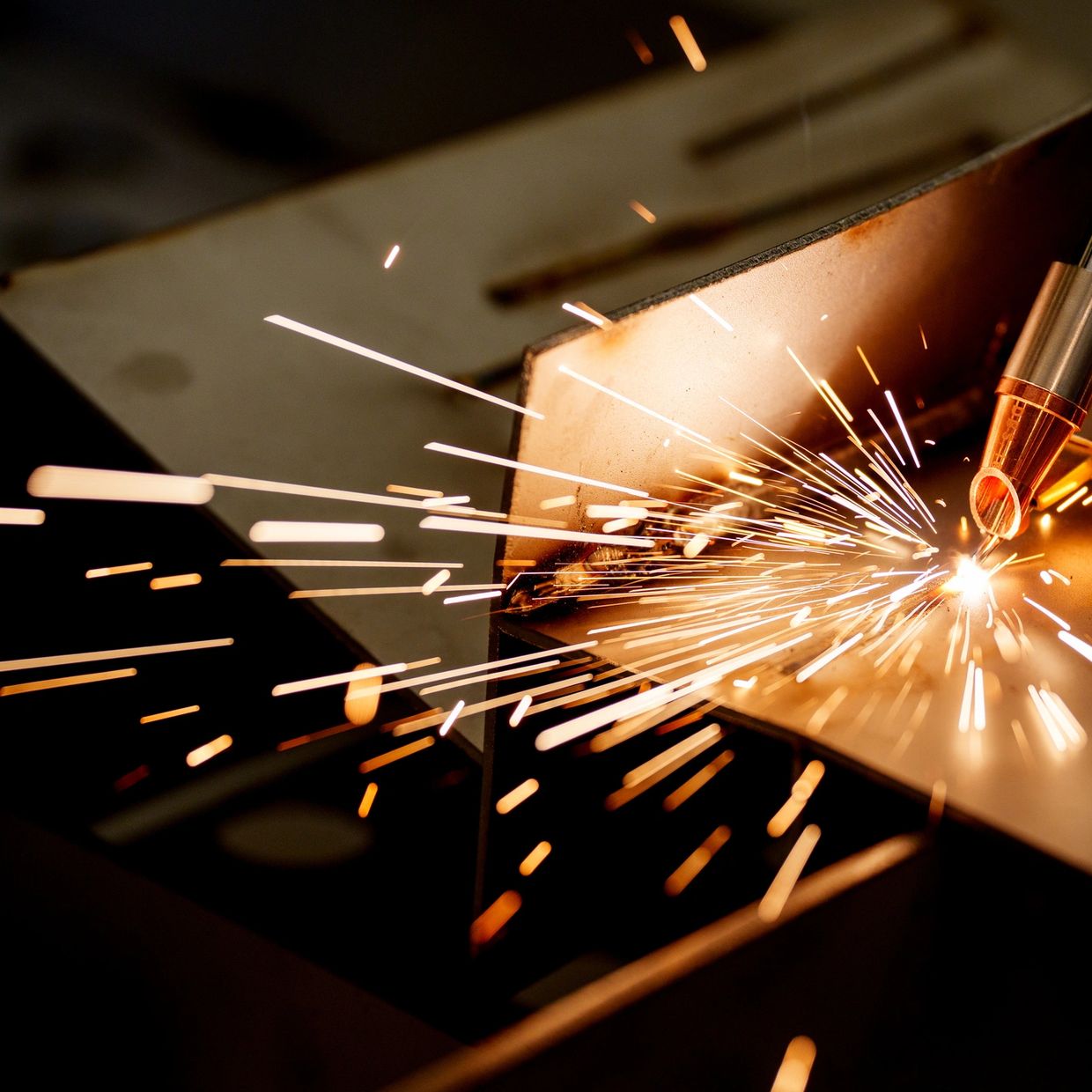 Sparks flying from metal cutting.
