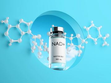 A vial labeled NAD+ with molecular structures on a blue background.