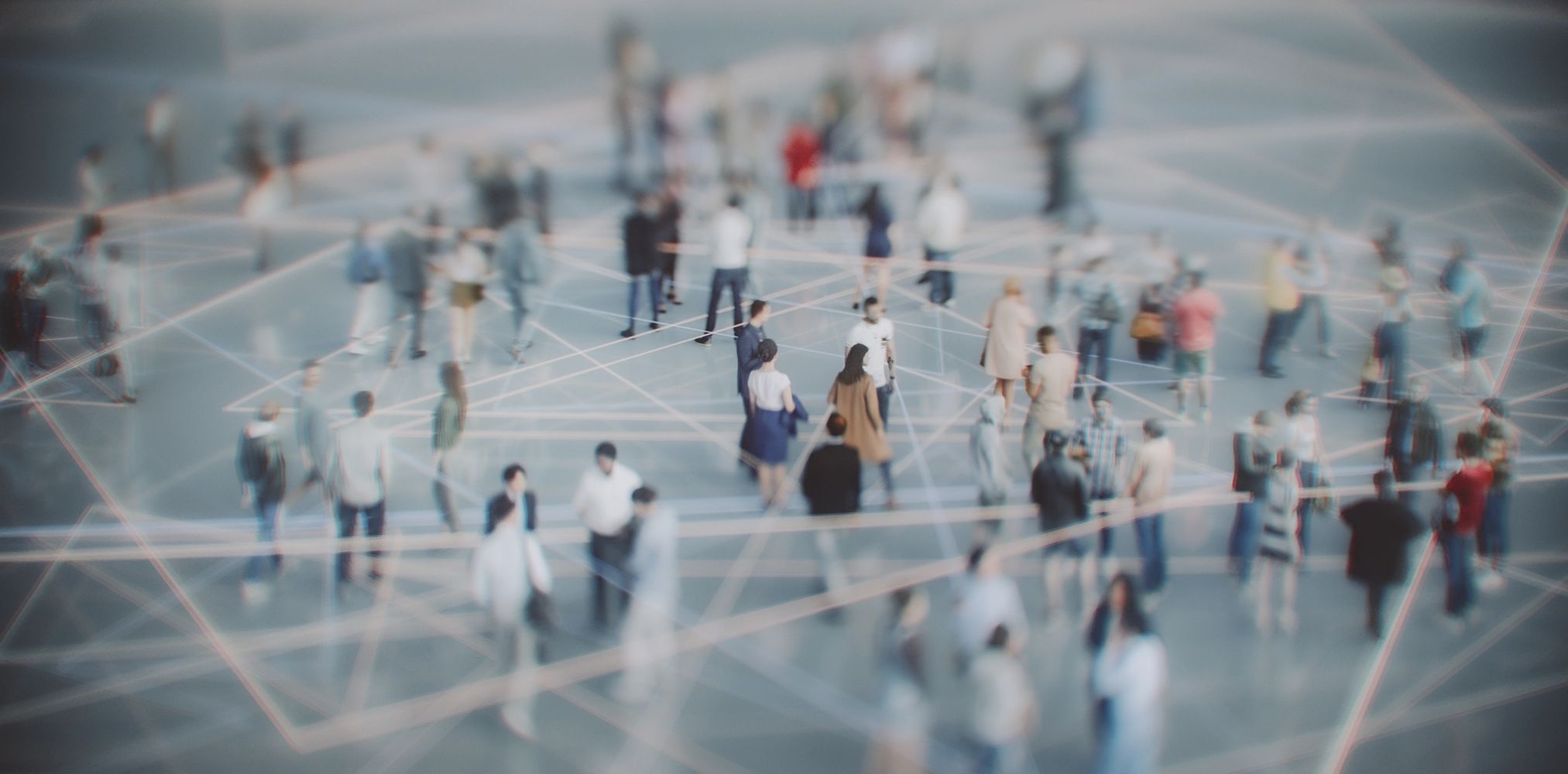 Blurry crowd connected by glowing network lines symbolizing social or digital connections.
